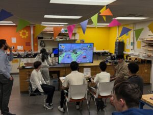 Students play Mario Kart with adaptive controllers