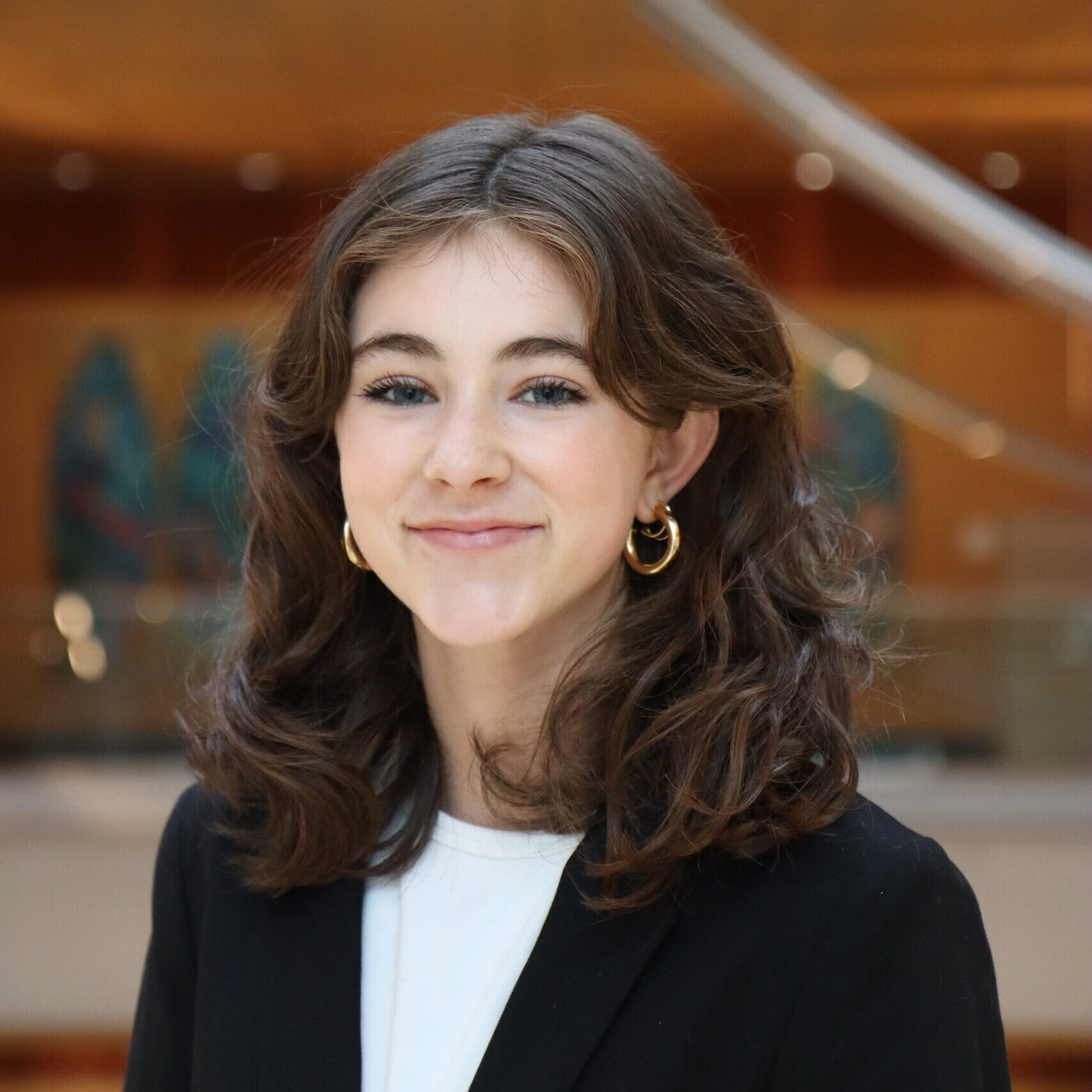 Erin O'Malley smiling in her headshot